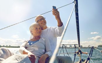 Retired couple on holiday on a yacht