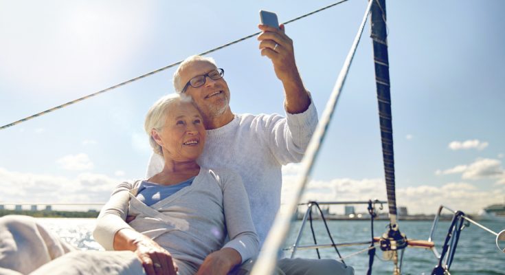 Retired couple on holiday on a yacht